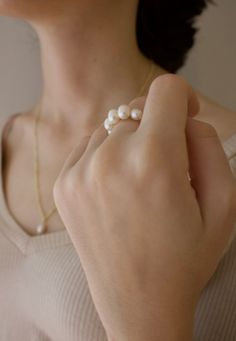 Freshwater Pearl Stretch Ring, a timeless and versatile accessory that exudes elegance. This ring features a lustrous freshwater pearl that adds a touch of natural beauty to your hand. The stretch design ensures a comfortable and adjustable fit, making it easy to wear on any finger. Whether you choose to adorn it casually or for a special occasion. Handmade Freshwater Pearls Sting is stretchy. Fits between ring size 6-9. Need a bigger size? Send me a message and ill be happy to assist (: How to Stretch Rings, Stretchy Rings, Freshwater Pearl Ring, Stretch Ring, Have A Blessed Day, Pearl Ring, You Choose, Fresh Water, Freshwater Pearls