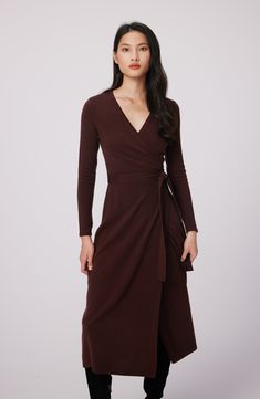 This quintessential wrap sweater-dress knit from luxe wool and cashmere features a sultry dipped neckline and waist-cinching sash. Surplice V-neck Long sleeves 70% wool, 30% cashmere Dry clean Imported Elegant Cashmere Sweater Dress For Work, Cashmere Sweater Dress For Work In Fall, Long Sleeve Cashmere Work Dress, Long Sleeve Cashmere Dress For Work, Long Sleeve Cashmere Dresses For Work, Brown Fitted V-neck Wrap Dress, Fitted Wrap Dress For Fall, Elegant Long Sleeve Wrap Dress For Winter, Fitted Cashmere Midi Dress