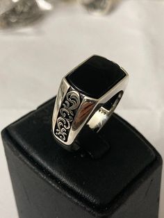 It is a carefully crafted product made of 925 sterling silver. Silver Onyx Signet Ring Luxury Style, Luxury Silver Onyx Signet Ring, Silver Onyx Signet Ring With Polished Finish, Luxury Silver Signet Ring With Onyx, Silver Onyx Gemstone Signet Ring, Formal Onyx Rings Stamped 925, Black Onyx Stone, Onyx Stone, Men's Ring