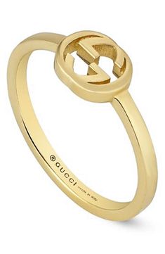 The recognizable GG-logo centers this 18-karat-gold ring that's perfect for stacking. 1/4" pendent; 1/8" band 18k gold Made in Italy Gucci Fine Jewelry Rings For Formal Occasions, Gucci Formal Fine Jewelry Rings, Gucci Fine Jewelry Yellow Gold Rings, Gucci Gold Fine Jewelry Rings, Gucci Yellow Gold Fine Jewelry Rings, Designer Gucci Yellow Gold Rings, Gucci Yellow Gold Rings For Formal Occasions, Luxury Gucci Round Ring, Gucci Designer Rings In 14k Gold