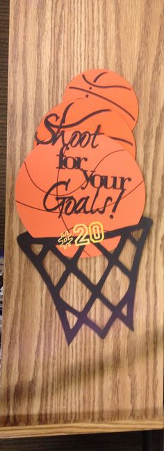 a wooden plaque that says shot for your goal with basketballs on it and the words shoot for your goal