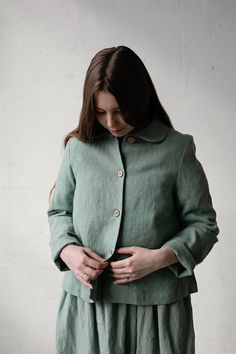 Classic jacket is made from 100% soft and washed heavy weight linen. Details: - Composition: 100% Oeko-Tex certified linen - A shaped - Colour: mint - Coconut buttons - Peter pan collar - Size: XS, S, M, L, XL, XXL - Heavy weight linen - Linen care: machine wash gentle; tumble dry low, ironing optional - The price is for one jacket, other pictured items are not included Unstructured Collared Linen Outerwear, Classic Linen Button-up Outerwear, Linen Button-up Utility Jacket With Pockets, Green Long-sleeved Linen Outerwear, Linen Collared Single-breasted Outerwear, Bee Embroidery, Classic Jacket, Linen Jacket, Spring Jackets