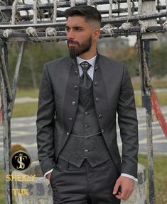 4 Piece Slim Fit Black Tuxedo Mandarin Collar Package includes  Jacket, Vest, Pants, bowtie, tuxedo shirt, brooch flower.  Shipped in large box to preserve the shape  Top quality guaranteed Black Tuxedo For Wedding And Gala Events, Luxury Three-piece Suit For Party, Elegant Black Wedding Blazer, Elegant Notch Lapel Suit For Wedding, Elegant Double Breasted Suit For Party, Elegant Double Breasted Party Suit, Elegant Suits For Gala Party, Fitted Blazer For Wedding, Fitted Blazer For Wedding Gala