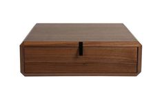 a wooden box with two drawers on it