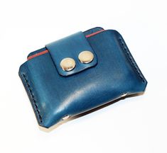 Leather credit card wallet! Very comfortable & easy to wear. Color: Blue. Size: 8 x 12 cm. It has 3 interior sleeves holds Nearly 12 cards , also Suitable for holding some cash. If you have some questions please write! Leather Card Holder With Cell Phone Pocket For Gift, Leather Card Holder With Cell Phone Pocket As Gift, Modern Blue Wallets For Gift, Blue Rectangular Wallet With Cell Phone Pocket, Blue Wallets With Interior Card Slots For Daily Use, Blue Coin Purse With Card Slots For Gift, Blue Travel Wallets With Card Slots, Blue Bifold Card Holder For Travel, Blue Trifold Wallet With Rfid Blocking For Everyday Use