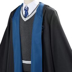 a male in a black and blue graduation gown with a white stripe on the collar