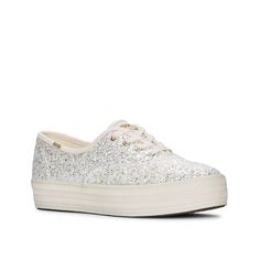 Keds-Glitter Platform Sneaker - Women's Notch up your casual style with the Glitter platform sneaker from Keds. Shimmery upper with a classic lace-up closure and a textured platform uplift the feminine flair of this low-top sneaker set on a durable rubber sole. The soft lining offers all-day comfort. Spring Glitter Lace-up Sneakers, Glitter High-top Sneakers For Spring, Trendy Sparkling Low-top Sneakers, Casual Low-top Sparkling Sneakers, Trendy Sparkling Lace-up Sneakers, Casual Lace-up Sneakers With Glitter Print, Low-top Synthetic Sneakers With Glitter Print, Casual Shimmer Sneakers With Round Toe, Low-top Glitter Print Sneakers