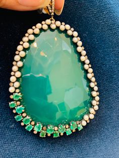 Stunning Emerald Diamond Green Onyx Pearl pendant, Beautiful Emerald pearl Pendant chic holiday wear elegant playful Gross Weight 40.10 Emerald 3.41 carats diamond .60 carats Onyx 137.55 carats Pearl 5.57 carats Lenght 3.6 inches 14k gold Silver HJ#11S600 Chic Holiday, Cocktail Jewelry, Citrine Necklace, Holiday Wear, Pink Sapphire Ring, Tourmaline Jewelry, Amethyst Jewelry, Tourmaline Ring, Emerald Gemstone