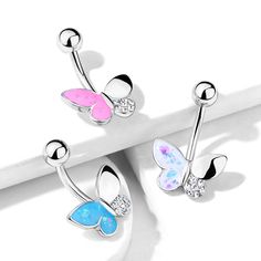 Butterfly with Opal Glitter Filled and Crystal Paved Wings 316L Surgical Steel Belly Button Navel Rings Bar Size: 14 Gauge (1.6 mm) Bar Length: 1" (25 mm) Material: 316L Surgical Steel / Brass Plating: Rhodium Stone Material: Crystal Sold by: 1 Pc Cute Belly Rings, Belly Button Piercing Jewelry, Belly Piercing Jewelry, Glitter Butterfly, Button Piercing, Multiple Ear Piercings, Ear Piercings Cartilage, Cute Piercings, Belly Button Ring