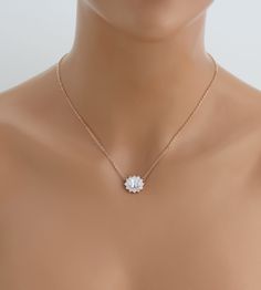 Pretty, dainty rose gold backdrop necklace for bride or bridesmaids with sparkly oval stones surrounded by small round stones. Created with Swarovski Pure Brilliance stones. Available in rose gold, yellow gold or rhodium (silver) finishes. Necklace measures 16 inches and extends to 18 inches Backdrop in photos measures 7 inches (choose your length from drop down menu) Earrings measure 1.25 inch Matching bracelets: https://www.etsy.com/listing/476201310/rose-gold-bracelet-crystal-bracelet?ref=sho Delicate Rose Gold Cubic Zirconia Bridal Necklace, Delicate Rose Gold Cubic Zirconia Necklace, Dainty Cubic Zirconia Backdrop Necklace For Gift, Dainty Cubic Zirconia Backdrop Necklace Gift, Rose Gold Solitaire Necklace For Wedding, Dainty Rose Gold Bridal Necklace For Anniversary, Rose Gold Delicate Chain Necklace For Bridesmaid, Rose Gold Necklace With Delicate Chain For Bridesmaid, Delicate Rose Gold Oval Pendant Jewelry