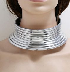 Silver tone Choker Collar Necklaces for Women. Alloy and Plastic Silver tone Statement Necklace Open Choker Bib Adjustable Necklace African Jewelry Necklace. I wear this necklace all the time, it's by far my favorite piece of accessory. I get so many compliments on it, it's very lightweight, comfortable, and it's durable. Its a very beautiful necklace, It looks really good on when Using it in a photo shoot, it's a perfect match with any clothes especially v-neck tops; a nice simple necklace well Metal Choker For Party, Metal Round Choker For Party, Round Metal Choker For Party, Adjustable Silver Alloy Choker, Trendy Adjustable Round Choker, Adjustable Round Trendy Choker, Silver Alloy Choker For Gift, Adjustable Alloy Choker, Silver Alloy Choker As Gift