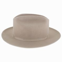 The American-made Stetson Open Road is crafted of Royal Deluxe Fur Felt, a material that repels moisture and is highly durable. It features a unique cattleman's crown surrounded by a narrow grosgrain ribbon hat band and the brim is trimmed with a ribbon-bound edge. The Open Road's easy styling allows it to transition from country to city wear and it looks equally stylish on a man or woman. The interior is fully lined and offers a Roan inner band. Add this investment piece of headwear to your hat Stetson Open Road, City Wear, Pork Pie Hat, Hat Size Chart, Pork Pie, Cloche Hat, Open Road, Felt Hat, Hat Band