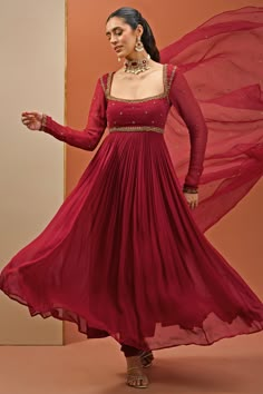 This exquisite Maroon Embroidered Georgette Anarkali Set exudes elegance and traditional charm. Crafted from premium georgette fabric, the full-sleeved maroon anarkali features intricate handwork on the neckline and waistline. Paired with a delicate organza churidar and a matching sheer dupatta adorned with subtle embellishments, this outfit combines sophistication with comfort. Perfect Anarkali for occasions like home poojas, family gatherings, or festive celebrations Composition : Anarkali, Churidar - Georgette, Dupatta - Organza and Lining - Semi crepe Care: Dry Clean Only and Vacuum Storage This product can be customized for sleeves, blouse length and neckline Delivery : 4-6 weeks as the product is hand crafted. Check Size Guide or choose MySize for free customisation (All Sizes above Hand Designs For Anarkali, Net Fabric Anarkali Dress, Anarkali Handwork Designs, Chiffon Anarkali Suits, Full Sleeves Anarkali Dress, Anarkali Dress Pattern New 2024, Anarkali Look For Wedding, Organza Dress Pattern, Anarkali Dress Pattern New