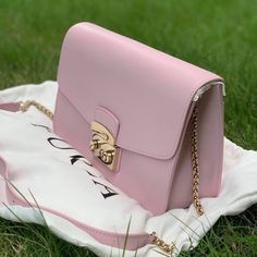 Authentic Furla Metropolis Shoulder Bag In Camellia Pink With Gold Hardware Retail Price: $492 Flap With Push Lock Closure Interior Zip Pocket Interior Slip Pocket Measurements: 6in (H) X 10in (L) X 3in (W) Designer Pink Crossbody Flap Bag, Pink Luxury Bags With Gold-tone Hardware, Designer Pink Flap Shoulder Bag, Luxury Pink Bags With Gold-tone Hardware, Designer Pink Shoulder Flap Bag, Luxury Pink Rectangular Flap Bag, Designer Pink Flap Bag For Formal Occasions, Elegant Pink Flap Bag For Formal Occasions, Luxury Pink Flap Bag With Detachable Strap