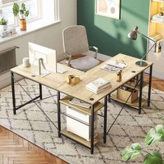 an office with green walls and wooden floors