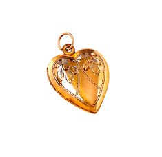 "Vintage 1940s 12K gold filled heart locket with etched floral hand engraved. This lovely statement pendant is engraved with a unique leafy flower design. The locket opens with ease and closes with a strong snap. It has a beautiful etched design on front. This would make a fantastic addition to any jewelry collection. A beautiful piece of keepsake jewelry. Marked 1/20 12K GF Locket measures 1\" X 3/4\" from the top of its original bale. A condition is excellent, with no damages or repairs. Heart Antique Heart Locket Necklace For Formal Occasions, Antique Yellow Gold Jewelry With Heart Charm, Valentine's Day Vintage Etched Jewelry, Vintage Etched Heart Pendant Jewelry, Victorian Yellow Gold Heart Charm Locket Necklace, Vintage Locket Necklace For Valentine's Day Formal, Victorian Yellow Gold Locket Necklace With Heart Charm, Elegant Etched Heart Pendant Jewelry, Antique Heart-shaped Jewelry For Vintage Collection