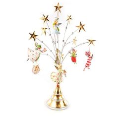 a christmas tree with gold stars and ornaments in it on a white background, surrounded by other holiday decorations