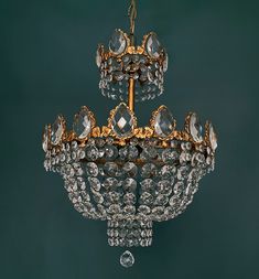 a fancy chandelier hanging from the ceiling