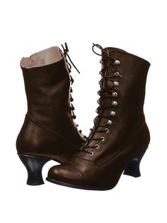 Fitted Mid-calf Boots With Reinforced Heel, Mid-calf Heeled Boots With Reinforced Heel, Fitted Martin Boots With Reinforced Heel For Fall, Fall Lace-up Boots With Wide Calf And High Heel, Fitted Mid-calf Boots With Round Toe For Fall, Fitted Mid-calf Platform Boots For Fall, Brown Pointed Toe Martin Boots, Brown Steampunk Boots For Fall, Steampunk Brown Boots For Fall