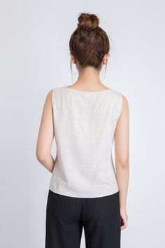 "It's called EveryWear because you can wear this linen tank top... well, everywhere. And we mean everywhere. At the office, happy hour, first dates, second dates, picnics, parties, BBQs, running errands, running 5Ks. You get the idea. DETAILS * 50% linen , 50% cotton blend * Scoop neckline * No zipper * Loose fit * Summer Tank top * Wash by hand or machine with cold water, Ironing after dry * Size Guide https://www.etsy.com/listing/722950722 * SIZE CHART https://www.etsy.com/listing/736810337 * Beige Ramie Summer Top, Beige Ramie Top For Summer, Summer Beige Ramie Tops, Beige Sleeveless Linen Top, Beige Linen Sleeveless Blouse, Beige Linen Tank Top For Summer, Sleeveless Flax Summer Tops, Long Linen Pants, Long Wool Skirt