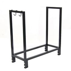 a black metal rack with two hooks on the top and one hanging from it's side