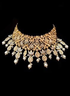 Indian bridal set makes every bride's outfit perfect. Clear Kundans adorn a hammered gold plated metal alloy. Beautiful grey shaded coating makes this bridal set special. This grey jewelry set is sure to make you stand out from the crowd. This necklace set comes along with a beautiful pair of Jhumka earrings & maang tikka with Kundan to match. Our Bridal collection is handmade with love & care. It makes us super happy to be part of your special day. The approximate earrings length is 3.5 Grey Jewelry, Gray Jewelry, Kundan Set, Maang Tikka, Choker Set, Bridal Jewellery Indian, Hammered Gold, Jhumka Earrings, Bride Clothes