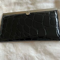 Black Patent Leather Wallet/Wristlet Trendy Rectangular Formal Wallets, Elegant Black Clutch With Card Slots, Elegant Rectangular Wallet As Fashion Accessory, Elegant Black Wallet, Elegant Rectangular Fashion Wallet, Classic Black Clutch With Card Slots, Black Leather Clutch With Snap Closure, Modern Black Clutch With Magnetic Closure, Black Bifold Clutch With Card Slots