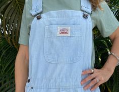 "Featuring a relaxed fit and timeless 90s look, these overalls will take you on a journey of effortless cool. In the summer pair with a white tee for the quiet luxury vibe,  wear into fall with  your fav henley or flannel for throwback 90s looks  Measurements: Waist: 34\" Inseam: 24\"  Max Length (Shoulder Strap to Bottom Hem): 56\" Model is 5 5\" Condition: Excellent" Light Wash Overalls, Womens Overalls, 90s Levis, 90s Looks, Quiet Luxury, Overalls Women, The Quiet, White Tee, Comfy Outfits