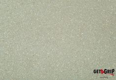 a close up view of a beige granite surface