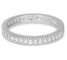 Simple and elegant, this sterling silver band ring looks stunning on its own or stacked with your favorite rings. Classic Stackable Cubic Zirconia Bands, Elegant Open Band Stackable Rings, Elegant Stackable Cubic Zirconia Rings, Elegant Stackable Midi Rings With Open Band, Classic Cubic Zirconia Jewelry With Ring Detail, Elegant Stackable Open Band Midi Rings, Stackable Open Band Cubic Zirconia Jewelry, Stackable Sterling Silver Eternity Band For Promise, Classic Adjustable Stackable Cubic Zirconia Rings