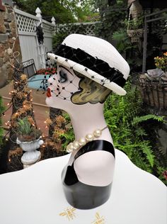 "LOVELY Classy Vtg 1940's Ladies White & Black Velvet Ribbon Woven Veiled Bumper Hat sz 21\" Diameter This is such a fun vintage Bumper hat from the 1940's. It's in just impeccable condition with no flaws I could note what so ever. The hat is a bright white woven fabric which feel synthetic to me. It has a short little brim which tilts up slightly at the sides with a gorgeous black veil attached to the front of the hat. There's a beautiful black velvet ribbon round the crown of the hat with Black Velvet Ribbon, Woven Hat, Mens Cardigan Sweater, M Photos, Black Veil, Miss Dior, Beautiful Hats, Velvet Ribbon, Wool Hat