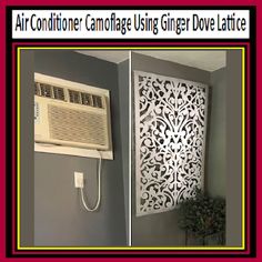 an air conditioner is hanging on the wall next to a window with decorative panels