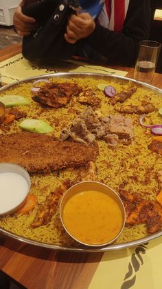 a large platter filled with food on top of a table