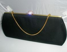 "This is a Beautiful Vintage eveningbag by Bobbie Jerome Crystal Latch, Satin Bag and satin lining.  This is a Very well taken care of Vintage Bag.  The bag is 11\"x5.5\" with a 10\" strap. The metal is in Amazing condition the satin is very clean.  Thanks for looking at our Eveningbag!" Rectangular Satin Evening Bag For Party, Elegant Formal Bags With Satin Lining, Elegant Rectangular Satin Bag, Elegant Rectangular Satin Evening Bag, Elegant Satin Rectangular Bag, Elegant Satin Rectangular Evening Bag, Evening Bags With Satin Lining, Formal Bags With Satin Lining, Luxury Satin Bags For Formal Occasions