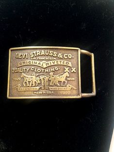 Here's an authentic Levi Strauss & Co. brass belt buckle from the seventies.  This one measures 4" x 2"  and has a registered R on the back.  The buckle could be polished for a brand new look!  Perfect gift and I have a his and her matching set, if you're interested I'll make you a deal on two. Vintage Brass Buckle Belt Buckles Collectible, Vintage Belts With Rectangular Antique Buckle, Vintage Belt With Antique Buckle, Vintage Gold Belt Buckles For Collectors, Collectible Antique Gold Belt Buckles, Collectible Gold Antique Belt Buckles, Gold Antique Buckle Vintage Belt Buckles, Vintage Gold Belt Buckle With Antique Detail, Gold Antique Buckle Vintage Belt Buckle