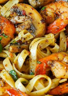 pasta with shrimp and peppers in a pan