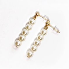 Material: Gold plating over alloy Stone: Pearl bead Size: 34mm Come with a gift box Reg: $29.99 Gold Alloy Jewelry With Pearl Charm, White Alloy Drop Earrings, Silver Alloy Drop Pearl Earrings, Silver Alloy Jewelry With Pearl Drop, Party Pearl Drop Alloy Jewelry, Elegant Hypoallergenic Alloy Earrings, White Alloy Jewelry With Pearl Drop, Elegant Alloy Earrings As Gift, Elegant Alloy Earrings For Gift