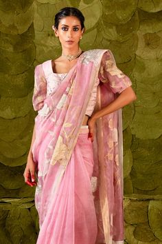 Begonia pink saree in checked organza, Karnataka silk, and Kanjeevaram tissue base embellished with silk tape, applique, and sequin work. Comes with floral embroidered blouse. - Aza Fashions Elegant Pink Chanderi Blouse Piece, Elegant Pink Chanderi Saree, Elegant Pink Blouse With Sheer Dupatta, Pink Wedding Pre-draped Saree, Pink Sheer Dupatta Traditional Wear In Organza, Pink Organza Traditional Wear With Zari Work, Organza Blouse With Dupatta, Elegant Pink Chanderi Pre-draped Saree, Transitional Organza Saree With Unstitched Blouse