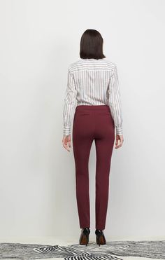 Burnish your pants profile with this slim pull-on ankle style. Cut in cabernet Italian stretch ponte knit, they boast hidden waist elastic and chic front pintucks for vertical emphasis. Fitted Burgundy Pants For Work, Chic Stretch Burgundy Pants, Chic Pull-on Dress Pants For Fall, Chic Fall Dress Pants With Pull-on Style, Elastane Dress Pants For Office In Fall, Burgundy Stretch Pants For Workwear, Chic Burgundy Workwear Pants, Burgundy Bottoms For Fall Workwear, Chic Elastane Pull-on Dress Pants