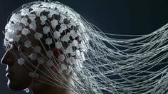 a woman's head is covered with wires