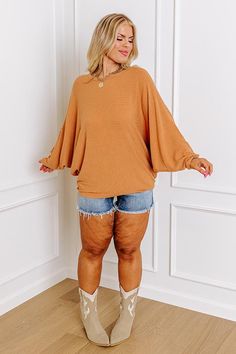 Keep your weekend style simple with this casual plus size pumpkin colored shift top featuring lightweight material with subtle horizontal accent stripes, a rounded neckline, long batwing sleeves, and a slouched silhouette that falls into a straight hemline! Measurements 1XL : Bust 40", Hip 40", Length 27", Sleeve Length 24", Waist 40". 2XL : Bust 42", Hip 42", Length 27", Sleeve Length 25", Waist 42". 3XL : Bust 44", Hip 44", Length 27", Sleeve Length 25", Waist 44". Oversized Ribbed Brown Top, Oversized Ribbed Top With Batwing Sleeves, Oversized Ribbed Batwing Sleeve Top, Skirt Outfits Summer, Indie Dresses, Casual Summer Outfits For Women, Shein Outfits, Trending Fashion Outfits, Athleisure Fashion