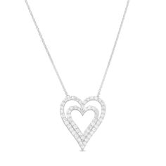 Double up on love and sparkle with this charming diamond heart-in-heart necklace. Fashioned in cool 10K white gold Smaller and larger heart outlines shimmer with diamonds in this layered design. The 1 ct. t.w. diamond design suspends centered along a cable chain. This 18.0-inch necklace secures with a spring clasp. Heart Outline, Peoples Jewellers, Double Up, Layered Design, Diamond Design, Diamond Heart, Layers Design, Cable Chain, Heart Necklace