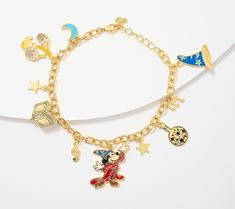 With a wave of your wrist, the enchanting universe of Disney's Fantasia comes to life. Each enameled charm on this Sorcerer Mickey bracelet is intricately detailed and will leave you spellbound. Mickey Bracelet, Disney Charm Bracelet, Disney Fantasia, Disney Charm, Sorcerer Mickey, Fantasia Disney, Disney Charms, Kids Necklace, Christmas 2024