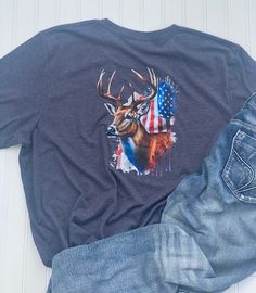 Deer with American Flag very soft T-shirt, Be unique. Great Gift with Man or Women   Polyester, Cotton, Rayon Blend  color: White Ordering and Shipping Your item will be shipped out the next day or in 5-6 days. Graphic Tee Tops For Outdoor Summer Activities, Summer Graphic Tee For Outdoor, Graphic Tee Tops For Summer Outdoor, Patriotic Summer T-shirt With Custom Print, Patriotic Short Sleeve Top With Custom Print, Casual T-shirt With Front Print For Outdoor, Summer Outdoor T-shirt With Front Print, Casual Outdoor Tops With Front Print, Sublimation Print Tops For Summer Outdoor