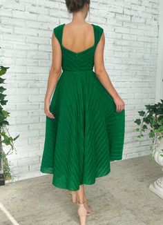 Green Midi Dress With Pleated Bodice For Evening, Dark Green Evening Dress For Spring, Dark Green Spring Party Midi Dress, Dark Green Midi Dress For Spring Party, Green Pleated Party Dress, Green Pleated Bodice Dress For Evening, Green Pleated Dress With Pleated Bodice For Evening, Green Pleated Dress For Evening, Fitted Green Dress With Pleated Back