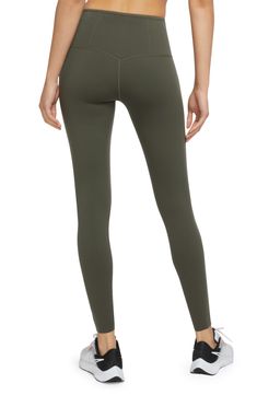 Signature Dri-FIT technology keeps you comfy and dry in second-skin leggings featuring multiple side pockets to keep small essentials secure while on the go. 27" inseam; 11" rise (size Small) Zip pocket Drop-in pockets Dri-FIT moisture-wicking technology 68% nylon, 32% elastane Machine wash, tumble dry Imported Functional Full-length Tights With Pockets, Functional Breathable Activewear With 5-inch Inseam, Functional Solid Color Nylon Yoga Pants, Fitted Activewear With Pockets In Recycled Polyester, Versatile Nylon Sports Tights, Functional Green Elastane Yoga Pants, Nike Functional Nylon Activewear, Sporty Go-dry Micro-elastic Tights, Moisture-wicking Solid Nylon Tights