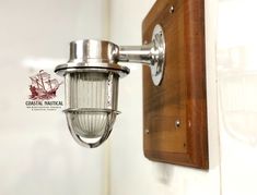 a light fixture mounted to the side of a wall