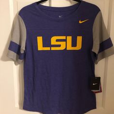 Never Worn Nike Lsu Shirt. Size M! Nike Purple Crew Neck T-shirt, Nike Purple Sporty Tops, Purple Nike Sporty Top, Nike Sporty Purple Top, Purple Crew Neck Top For College, Nike Purple Tops For Spring, Purple Graphic Print Top For College, Sporty Purple Top With Letter Print, Purple Letter Print Top For College