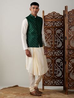 Vastramay Men's Green Jacket Pleated Kurta with Pyjama Set Experience traditional elegance with modern style in the Vastramay Men's Green Jacket Pleated Kurta with Pyjama Set. Made from premium fabric, this set is perfect for festive occasions and weddings. The jacket adds a touch of sophistication, while the pleated kurta and pyjama ensure comfort and style. Stand out in the crowd with this unique ensemble. Features: Premium fabric for comfort Elegant jacket for a sophisticated look Pleated kur Festive Classic Long Sleeve Outerwear, Classic Long Sleeve Festive Outerwear, Festive Fitted Outerwear With Stand Collar, Traditional Winter Outerwear For Groom, Classic Long Sleeve Nehru Jacket For Festive Occasion, Fall Festive Nehru Jacket, Traditional Tailored Outerwear For Festive Season, Traditional Semi-formal Outerwear With Stand Collar, Traditional Tailored Festive Outerwear