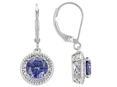 Bella Luce® Esotica™ tanzanite and white diamond simulants 4.61ctw round, platinum over sterling silver earrings. Measures approximately 0.94" L x 0.44" W and has leverbackings. Classic Silver Tanzanite Earrings, Silver Tanzanite Drop Earrings, Round Tanzanite Jewelry With Diamond Accents, Tanzanite Jewelry With Halo Design And Round Cut, Tanzanite Earrings With Prong Setting, Round Cut Tanzanite Jewelry With Halo Design, Round Cut Tanzanite Halo Jewelry, Classic Round Tanzanite Earrings, Round Tanzanite Earrings For Anniversary